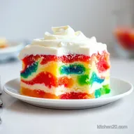 Rainbow Jell-O poke cake: A fun, retro treat!